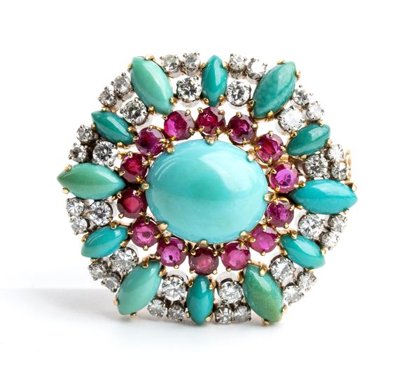 Gold brooch with turquoise, rubies, and diamonds