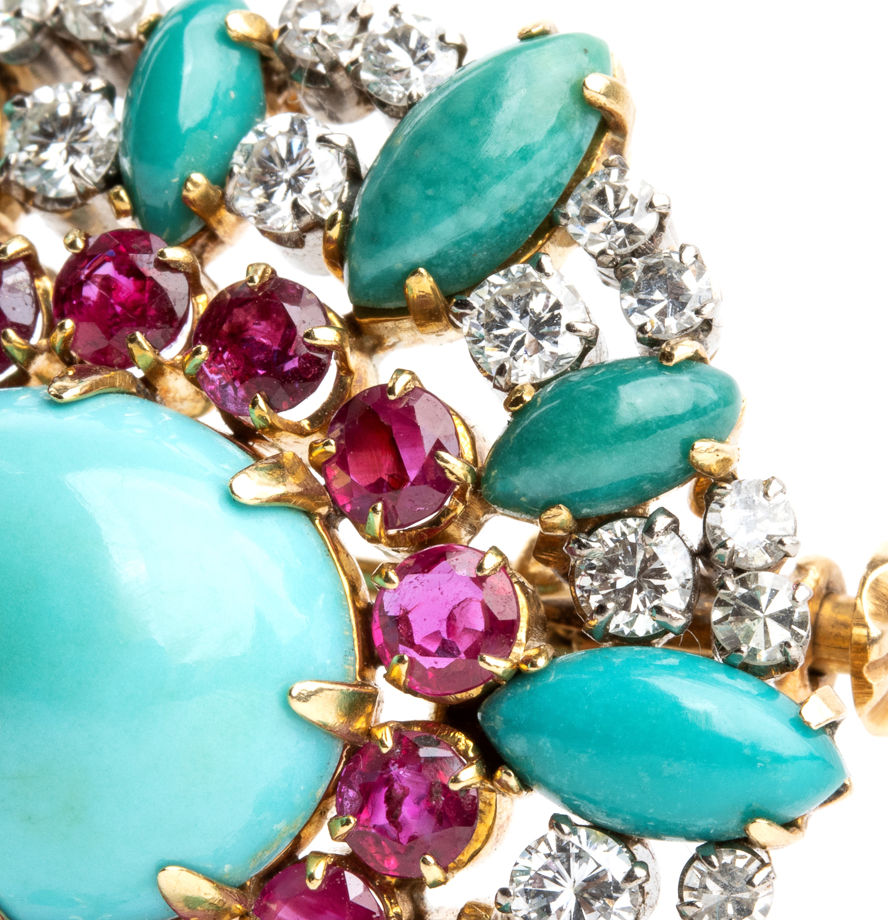 Spilla in oro con turchesi, rubini e diamanti