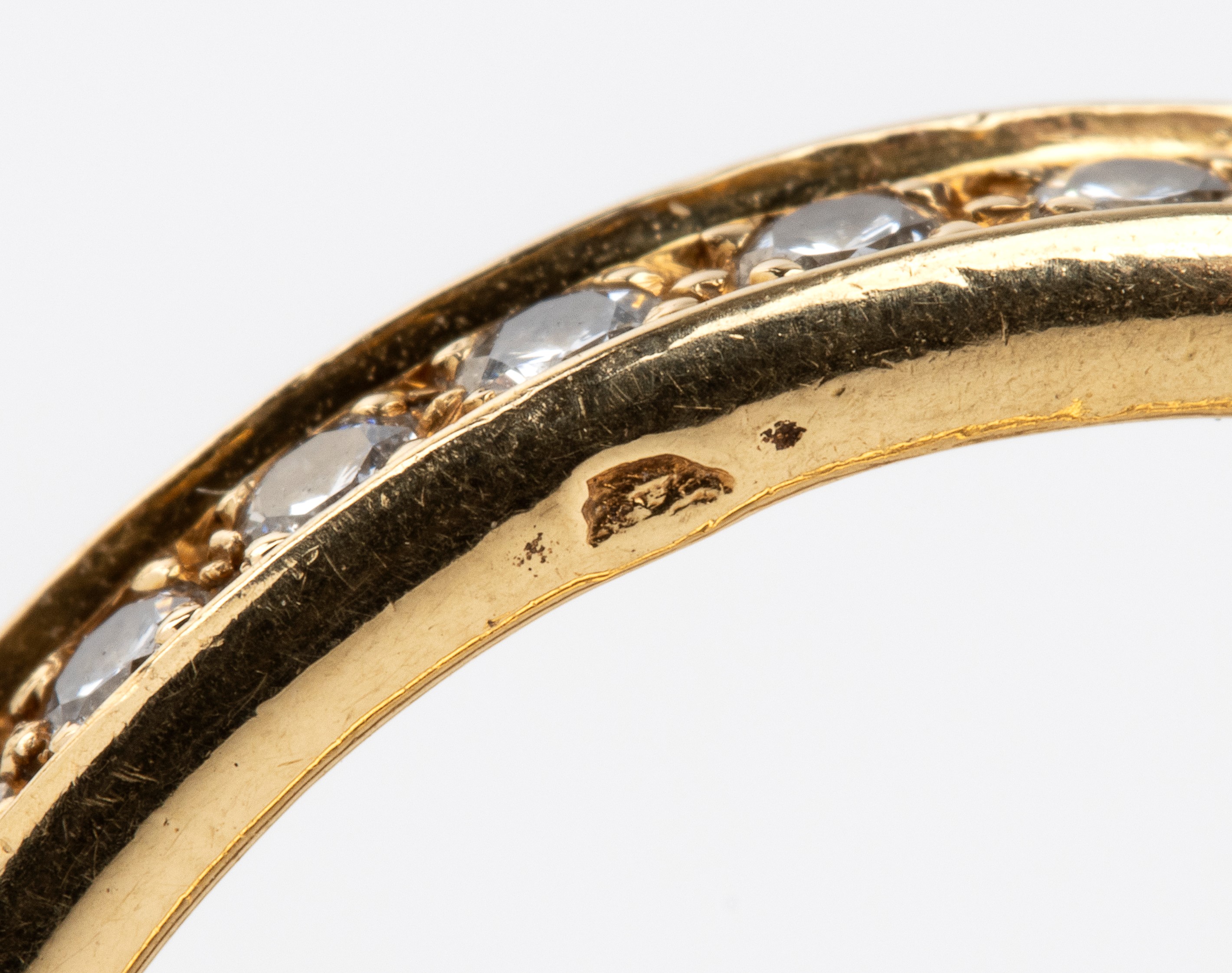 Collezione Trinity: anello in oro e diamanti