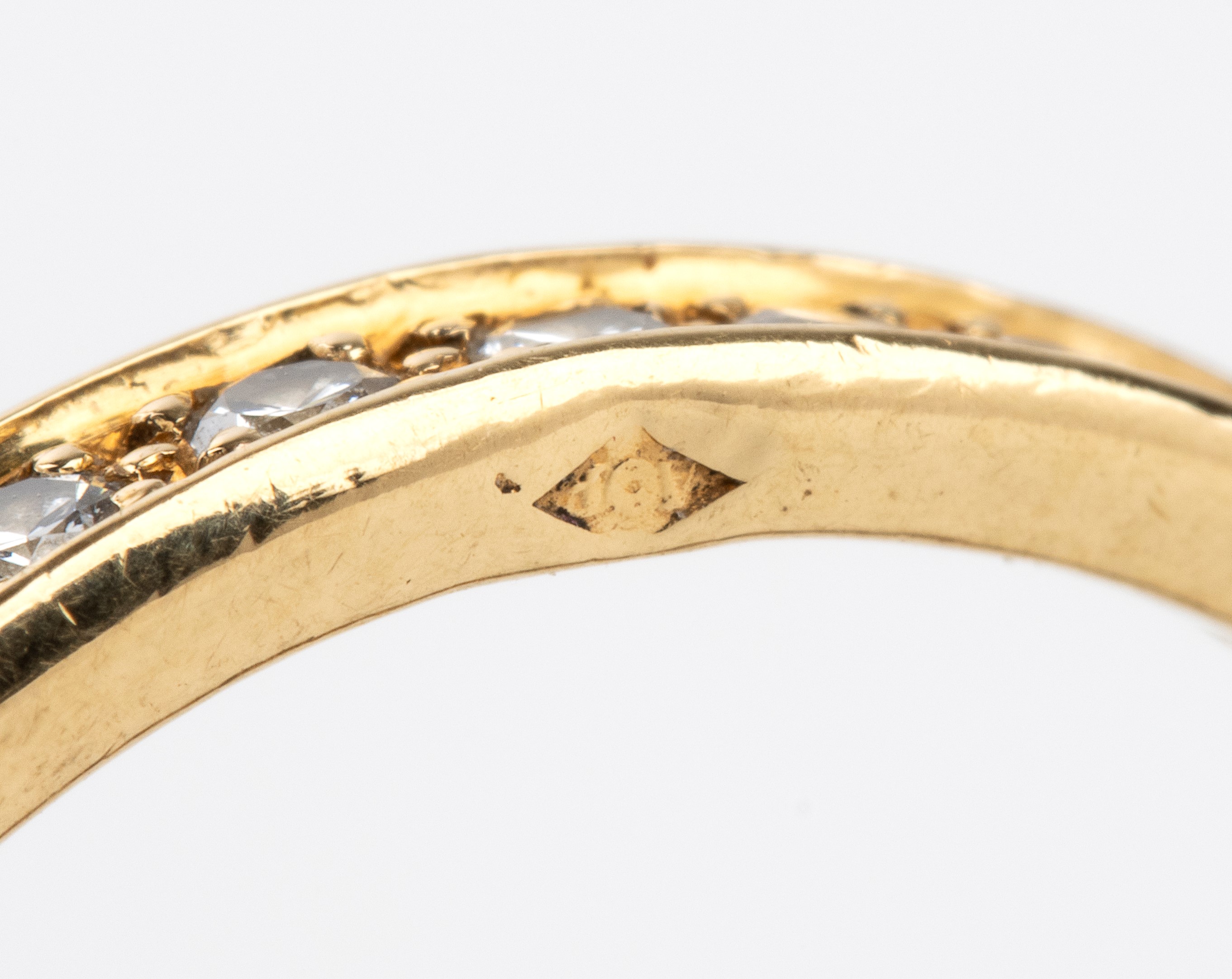 Collezione Trinity: anello in oro e diamanti