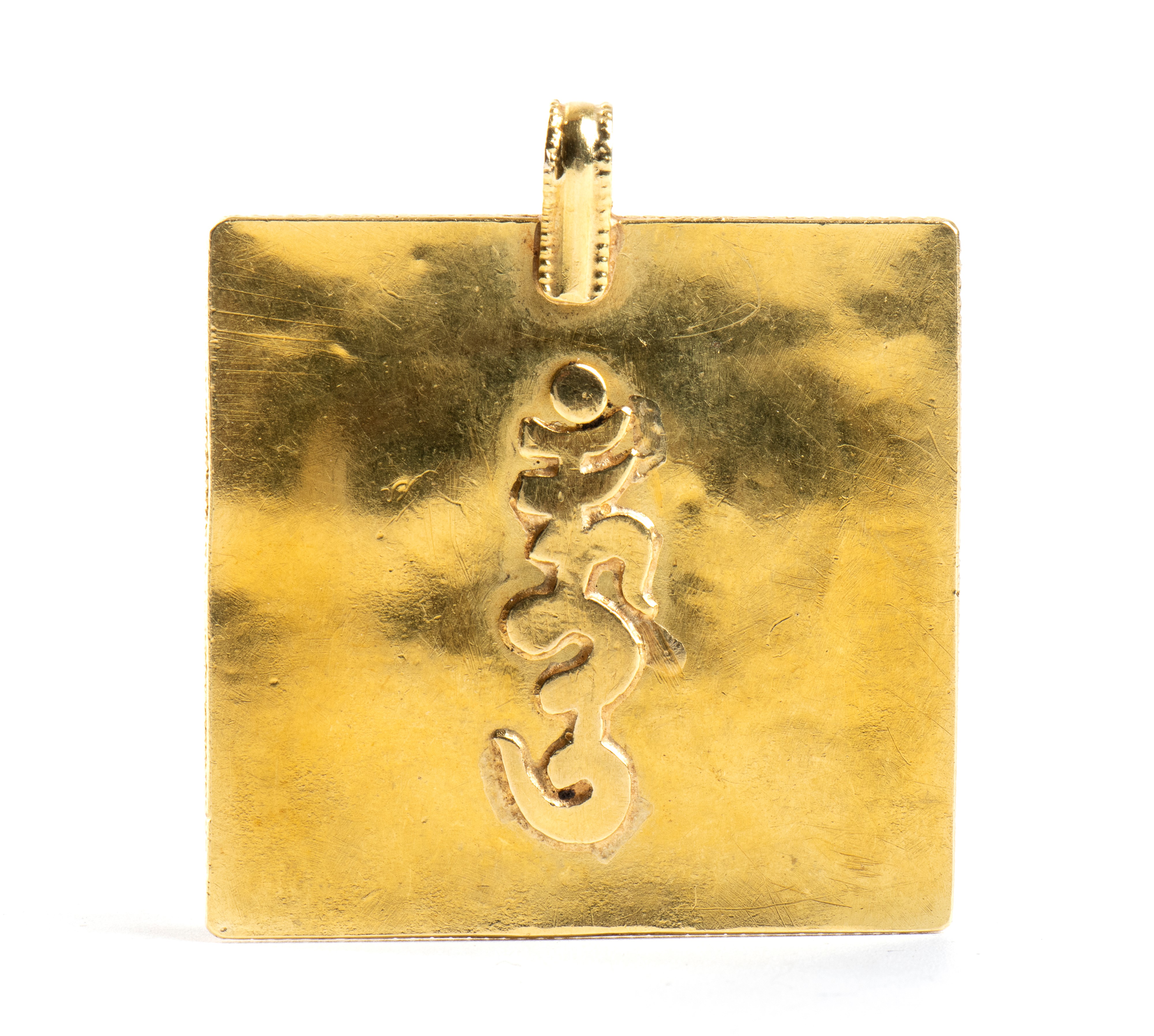 Pendente in oro e inserti in corallo e turchesi