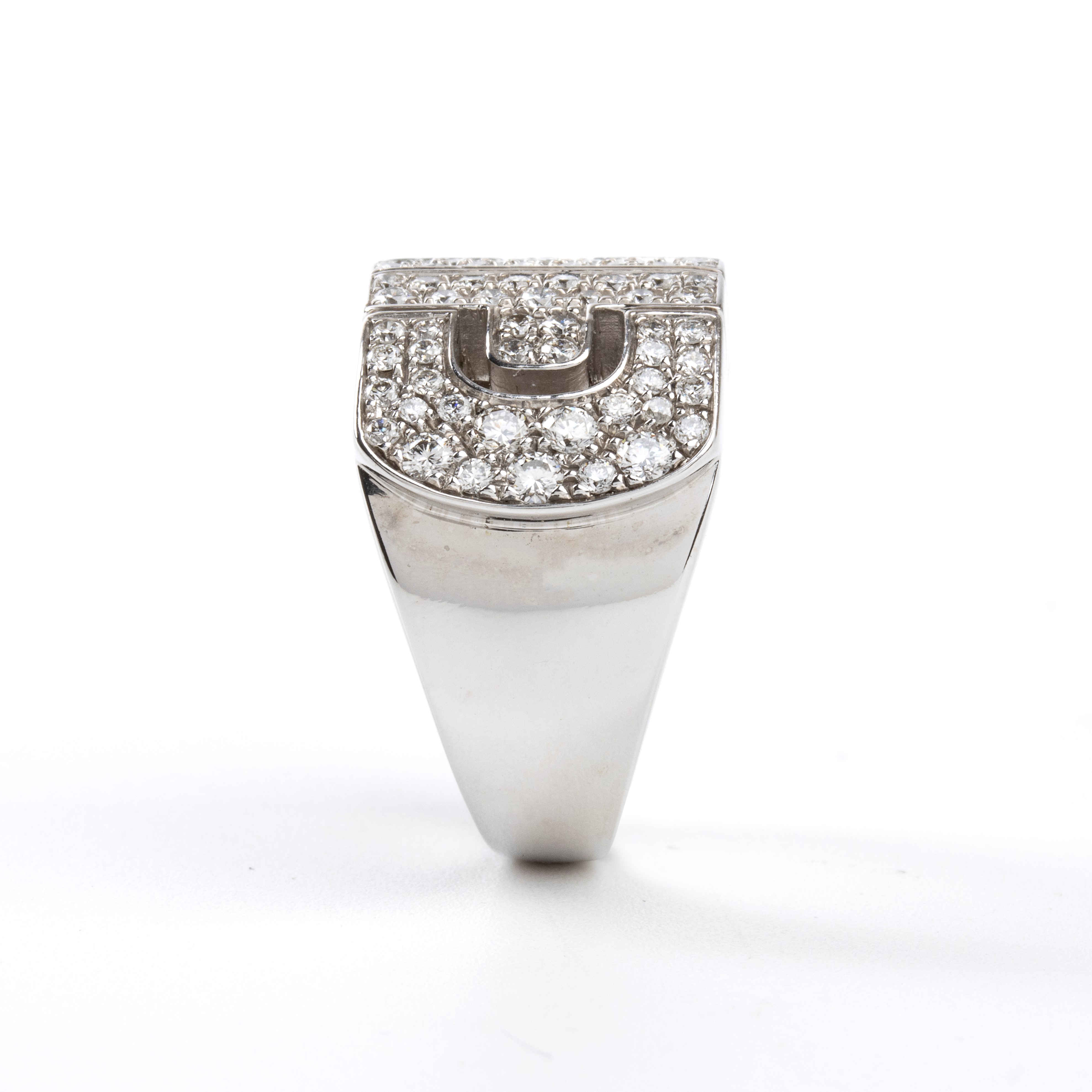 Collezione Parentesi: anello a fascia traforata in oro e diamanti